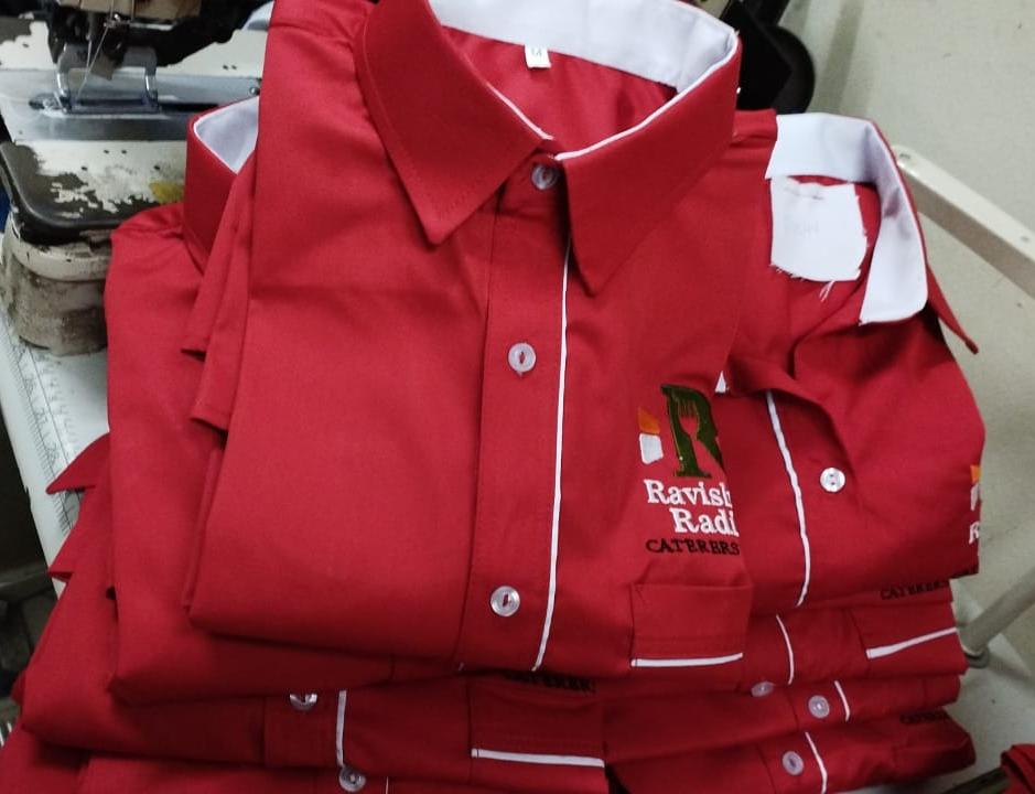 Red embroidered corporate shirts produced by Vewan